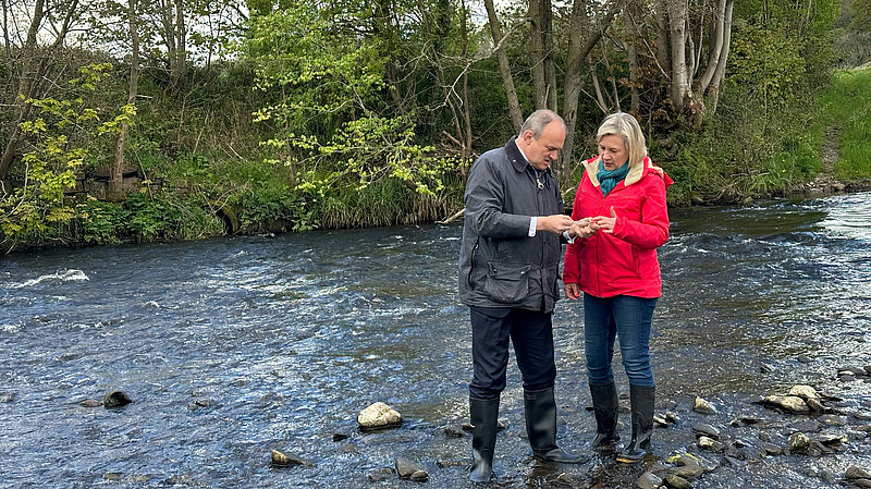 Ed Davey and Lisa Smart testing water quality in the Rover Goyt
