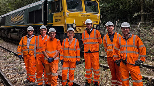 Lisa Smart MP inspects the rail freight delivery at the at the Tarmac site in Bredbury 