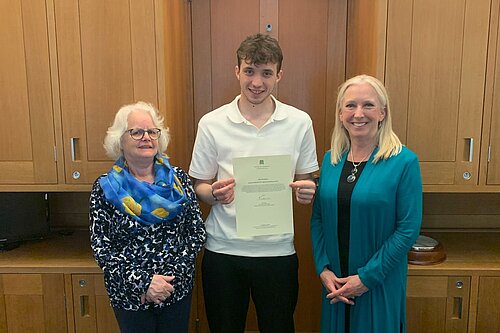 Roz Savage South Cotswolds MP presenting EDM to Ben Thornbury