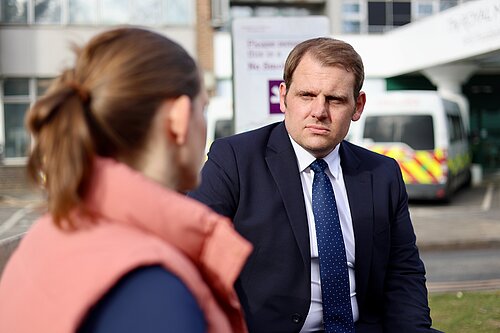 Luke Taylor MP talking to a constituent