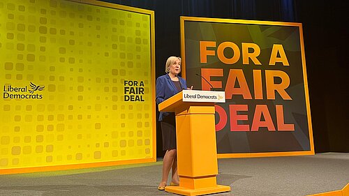 Lisa Smart giving the keynote address at the Lib Dem Conference