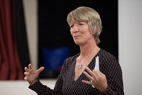 Pippa Heylings making a speech at a conference
