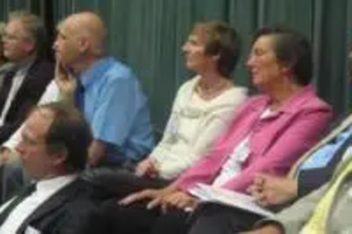 Group of Lib Dems listening to conference debate