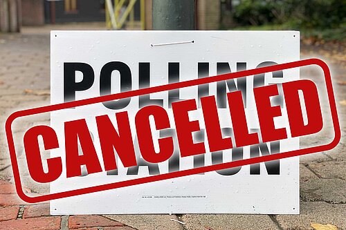 Cancelled polling station sign
