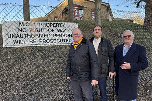 Councillors Mike Thompson and Tony Harwood and local resident Geoff Samme outside Invicta Barracks