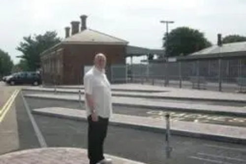 Tom McNeice by coach parking spaces at Folkestone West