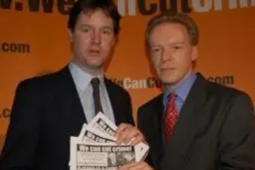 Stephen Robinson shows Nick Clegg the "We Can Cut Crime" surveys from Chelmsford