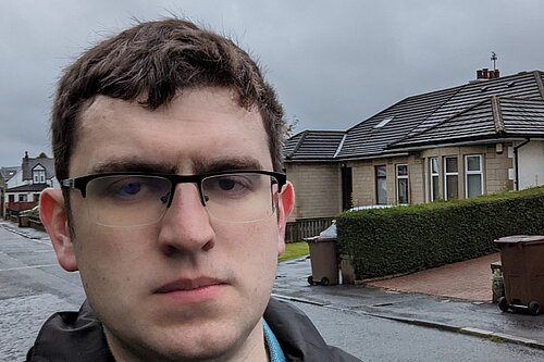 Grant Toghill with houses in the background.