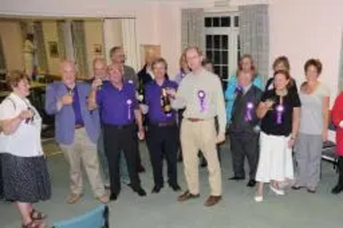 Some Jubilant Referendum activists break open the Champagne for an Impromptu celebration in the Town Hall as result is announced.