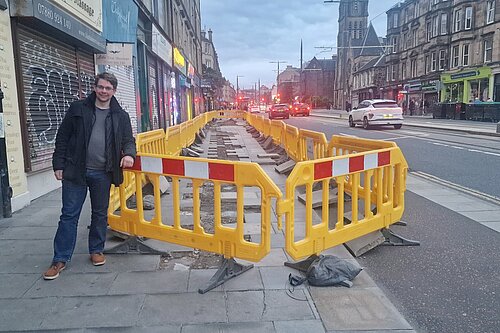 Jack Caldwell standing by roadworks