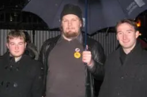 Manchester Withington MP John Leech (right), with Manchester LGBT Lib Dem activists Dave Page (center) and Benji Starr (left) at Transgender Day of Remembrance 2009 in Sackville Pack, Manchester