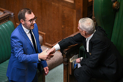 Tom Gordon in the House of Commons shaking hands with the Speaker of the House of Commons, Sir Lindsay Hoyle