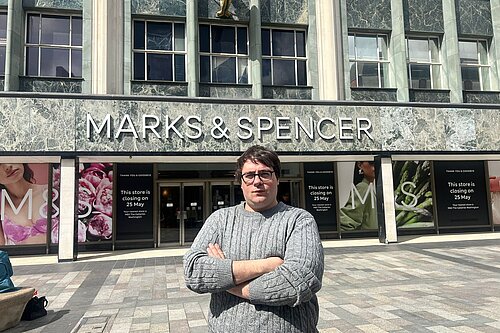 Paul Edgeworth stood with his arms crossed in front of the Marks and Spencers building on High Street West in Sunderland
