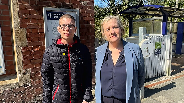 Accessible rail campaigner Nathaniel Yates and Lisa Smart MP at Woodley train station