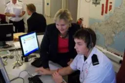 Matt Riches shows Terrye Teverson around the fire control office