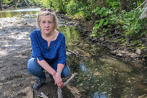 Lisa Smart looking concerned at the Goyt river bed