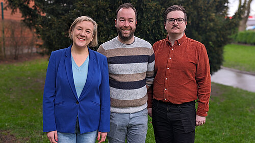 Cllr Jake Austin; Cllr Mark Roberts, leader of Stockport Council; and Lisa Smart MP