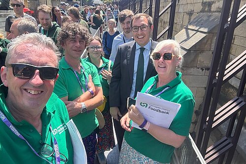 Tom Gordon and four foodbank volunteers in Parliament