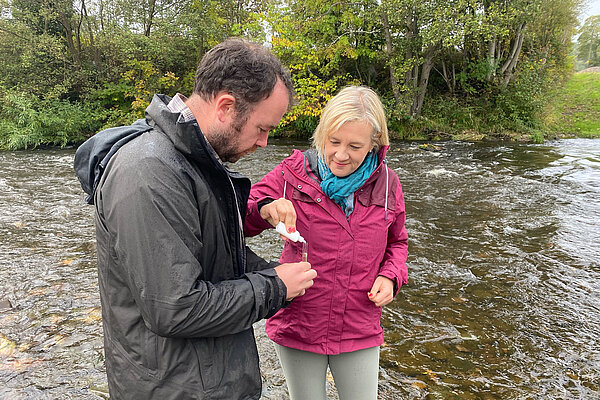 Mark and Lisa undertaking water testing