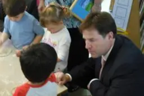 Nick Clegg talking to young children