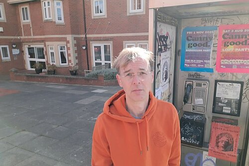Mark with Phone box outside Jack Common House