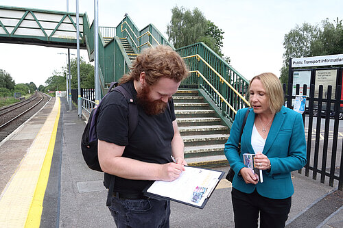Helen gets petition signatures at Whitchurch station to make it fully accessible