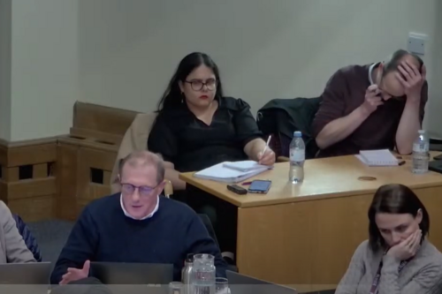 Tory Councillors in Chamber while press watch 