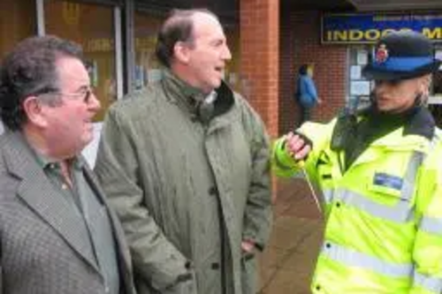 Liberal Democrat Presdent Simon Hughes MP alongside Councillor Peter Rush and local PSCO Julie