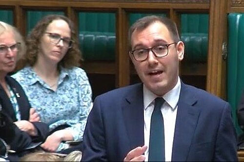 Alison Bennett listening to the debate in the House of Commons today while her Liberal Democrat colleague, Tom Gordon MP, speaks