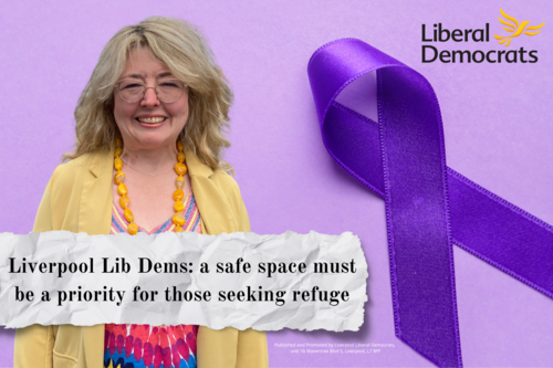 Cllr Liz Makinson with purple ribbon in the background