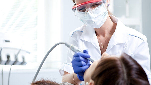 A dentist at work
