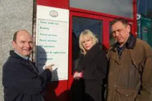 Jeremy Davies, Kim Checchetto and Roger Tichborne outside Mill Hill Post Office