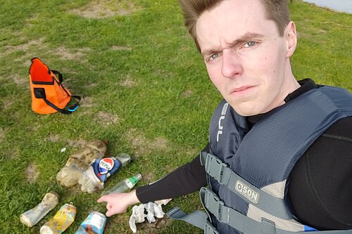 Cllr Hunt with some of the retrieved litter