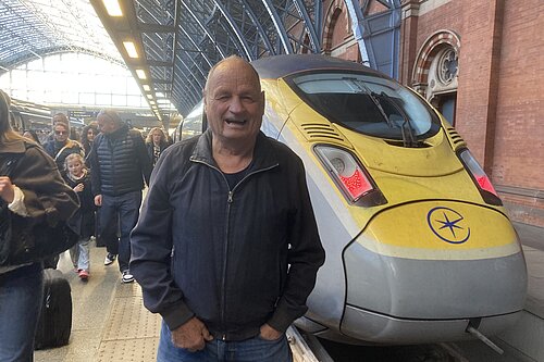 Jim Candy at a station