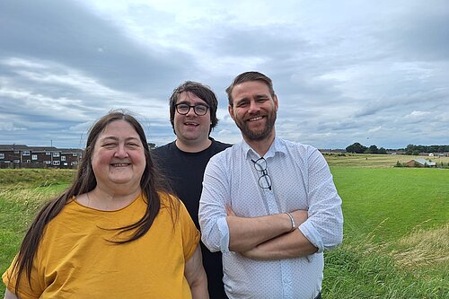 Councillors Margaret Crosby, Paul Edgeworth and Stephen O'Brien standing in a row in Thorney Close