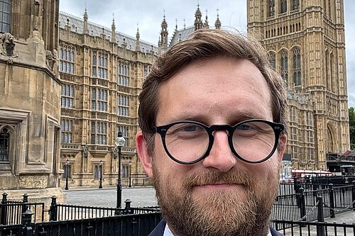 Freddie standing outside Westminster