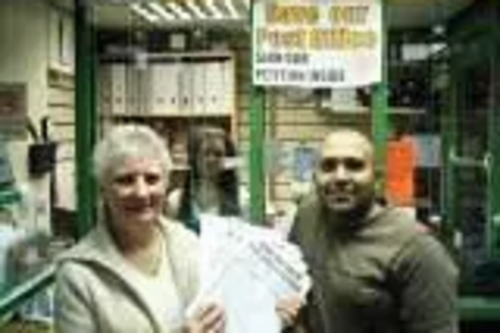 Councillor Pat Colclough alongside Buersil Post Master Jay Patel