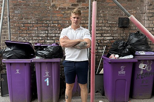 Carl Cashman in front Bins