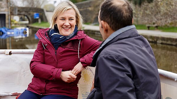 Lisa talking to a member of the public