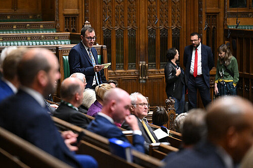 Tom Gordon speaking in the House of Commons Chamber