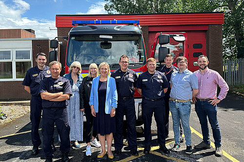 Lisa Smart with the Offerton fire crew and local Liberal Democrat Councillors