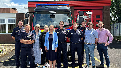 Lisa Smart meets members of the Offerton fire crew together with local Liberal Democrat councillors