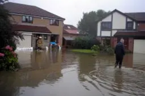 John Shipley inspects flooding in Parklands