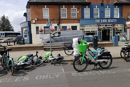 E-bikes parked in cycle bay